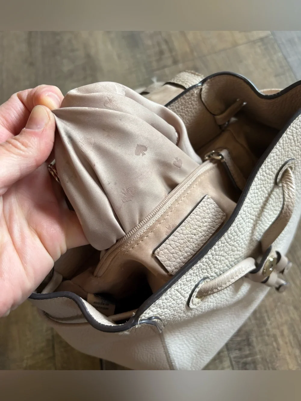 Kate Spade women’s Leila Medium Flap Backpack beige cream pebbled leather purse